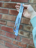 IOC light grey / beige cloud lanyard